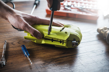 Fototapeta premium man to repair jigsaw
