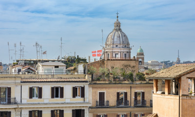 Fototapeta na wymiar The Spanish Steps in Rome lead from Spanish Square to the Trinita dei Montina Church on top of Pincho Hill. At the foot of the Spanish Steps is the square with the fountain 