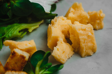 Caesar salad ingredients on a light background