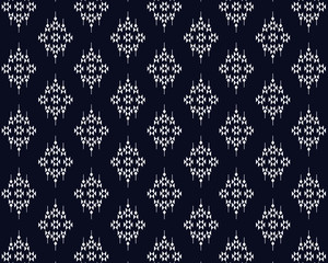 Geometric ethnic seamless pattern traditional design on dark midnight navy background. White geometry abstract African for wallpaper handcraft, carpet, clothing, fabric, wrapping. Embroidery design. 