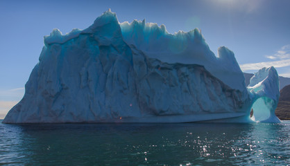Fototapeta na wymiar Beautiful landscape with iceberg in Greenland at summer time. Sunny weather.