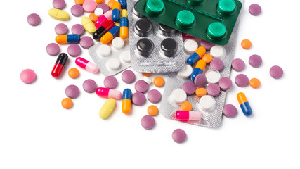 Different colored pills, capsules and blister