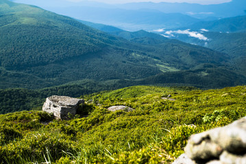 Fototapeta na wymiar mountain landscape. background of mountain stones from the top. summer tourism