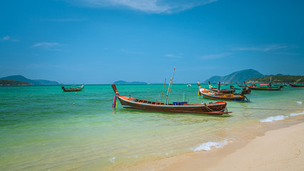 Fototapeta na wymiar Wooden Boat With Tropical Sea Scenery