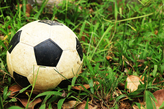 Football, soccer ball close up image on grass play ground image
