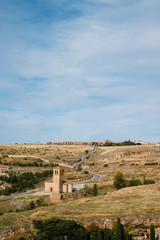 Fototapeta na wymiar View of the countryside surrounding Segovia and Vera Cruz church, Castilla y León, Spain