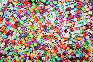 top view of colorful dices, cubes with a to z letters on it