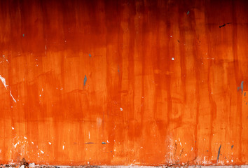 Grunge orange texture of the wall