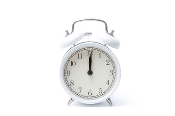 Naklejka premium Retro alarm clock or vintage alarm clock isolated on white background