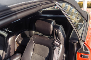 leather black car interior with suede