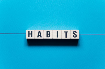 Habits word concept on cubes