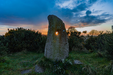 The Holestone, ancient Bronze age standing stone that sits atop a small rocky outcrop outside...