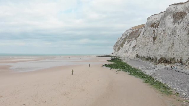 Aerial footage on the beach of Escalle, Cap Blanc Nez, France, white cliffs seeing the ferry to England in the distance