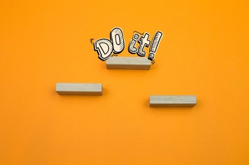 Concept For Motivation To Do In Business. Orange background and copy space