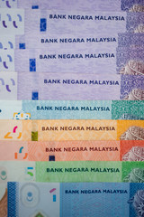 Malaysia currency of Malaysian ringgit banknotes background. Paper money of ten, twenty, fifty and hundred ringgit notes. Financial concept.