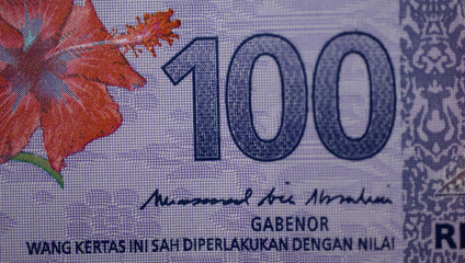 Malaysia currency of Malaysian ringgit banknotes background. Paper money of Hundred ringgit notes on etreme closeup. Financial concept.