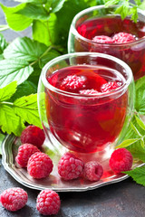 Raspberry beverage with berries, selective focus