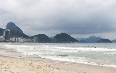 Fototapeta na wymiar early morning at copacabana beach rio de janeiro before the rain