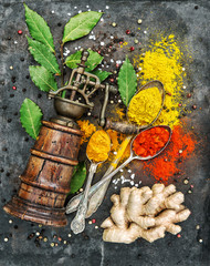Food background Spices old pepper mill Curry paprika ginger