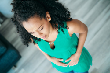 Young African American Woman With Menstrual Pain