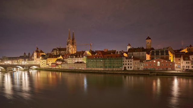 Time lapse panorama of Regensburg from side of Danube river, Bavaria, Germany