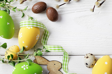easter eggs and flowers, copy space for text