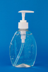 Hand sanitizer isolated on a blue background