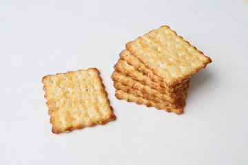 Toasted tasty square crackers close up