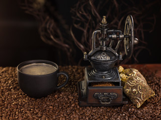 Fototapeta na wymiar antique hand coffee grinder and coffee beans