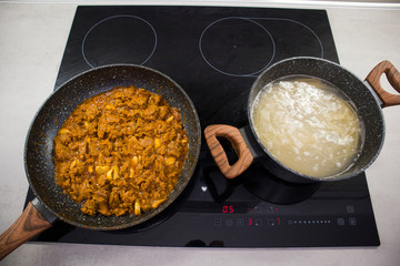 pasta cooking process spaghetti bolognese tomato paste meat and greens italian cuisine