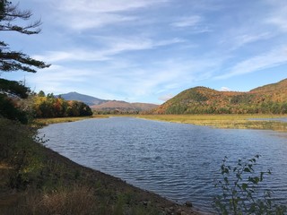 Far away hills behind pond