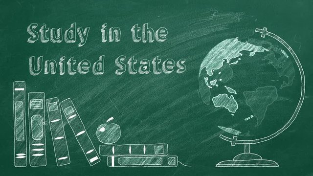 Lettering "Study in the United States", rotating globe and school books are drawn with chalk on a blackboard. Study abroad concept.