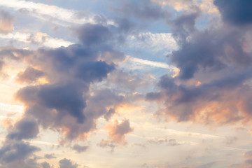 Naklejka na ściany i meble beautiful colorful clouds in the sky at sunrise