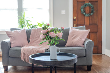 Pink accents in the living room for Spring