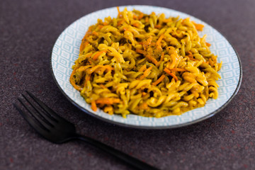 plant-based recipes, fusilli pasta with vegan creamy sauce made with mustard coconut yoghurt and nutritional yeast
