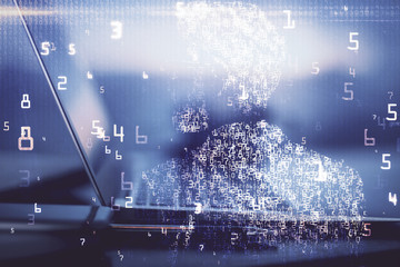 Computer on desktop in office with technology theme hologram. Multi exposure. Tech concept.