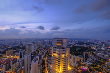 Fototapeta na wymiar high angle view of illuminated singapore financial buildings 