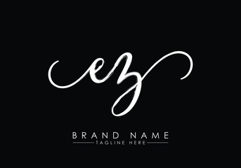 Fototapeta na wymiar E Z Initial handwriting logo vector, Handwriting logo design with Brush, Logo for fashion, team, wedding, luxury logo. y logo. SS initial logo