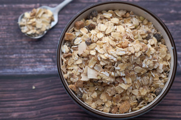 top view of fresh oats in a bowl for morning breakfast 