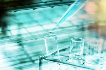Double exposure test-tube in science background concept.