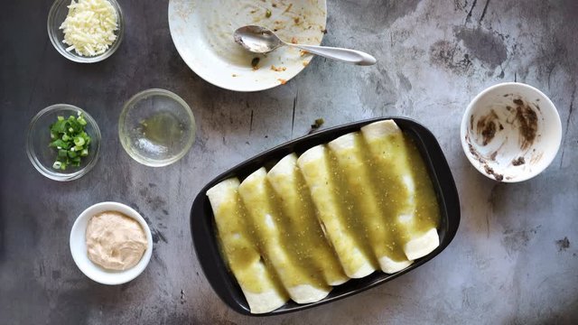 Stop Motion Video of Black Bean Salsa Verde Enchiladas Being Prepared