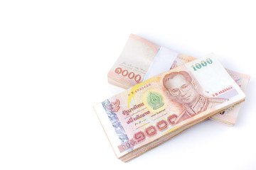 Thai money banknotes 1000 baht on white background, business investment concept .Selective focus.