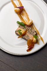 Duck Terrine. Traditional French cuisine a loaf of forcemeat or aspic, similar to a pâté, cooked...