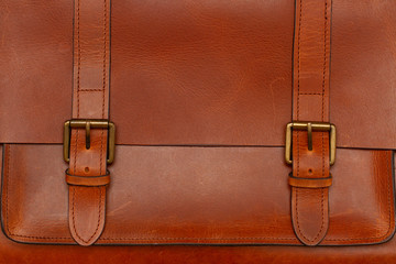 close-up of a genuine leather brown briefcase with buckley's