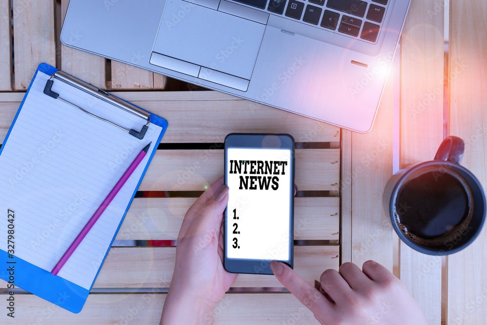 Poster writing note showing internet news. business concept for the information about current events publis