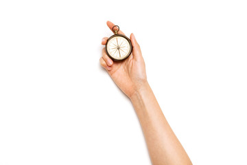 Woman hand hold a compass isolated on white.
