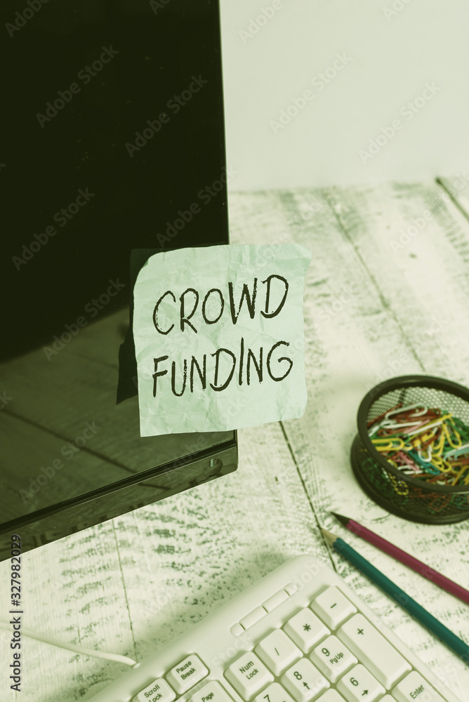 Poster writing note showing crowd funding. business concept for technique of raising money from a large num