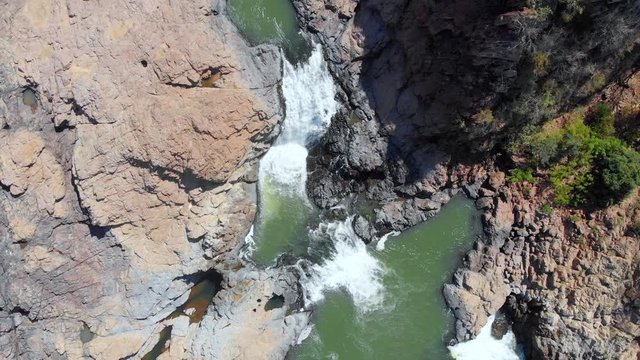 Small waterfall in drying river bed in Zimbabwe, aerial view