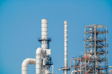 Industrial zone,The equipment of oil refining,Close-up of industrial pipelines of an oil-refinery plant,Detail of oil pipeline with valves in large oil refinery.