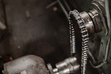 heavy industry gear chain hardwork with machine roller high force power durable with space for text.